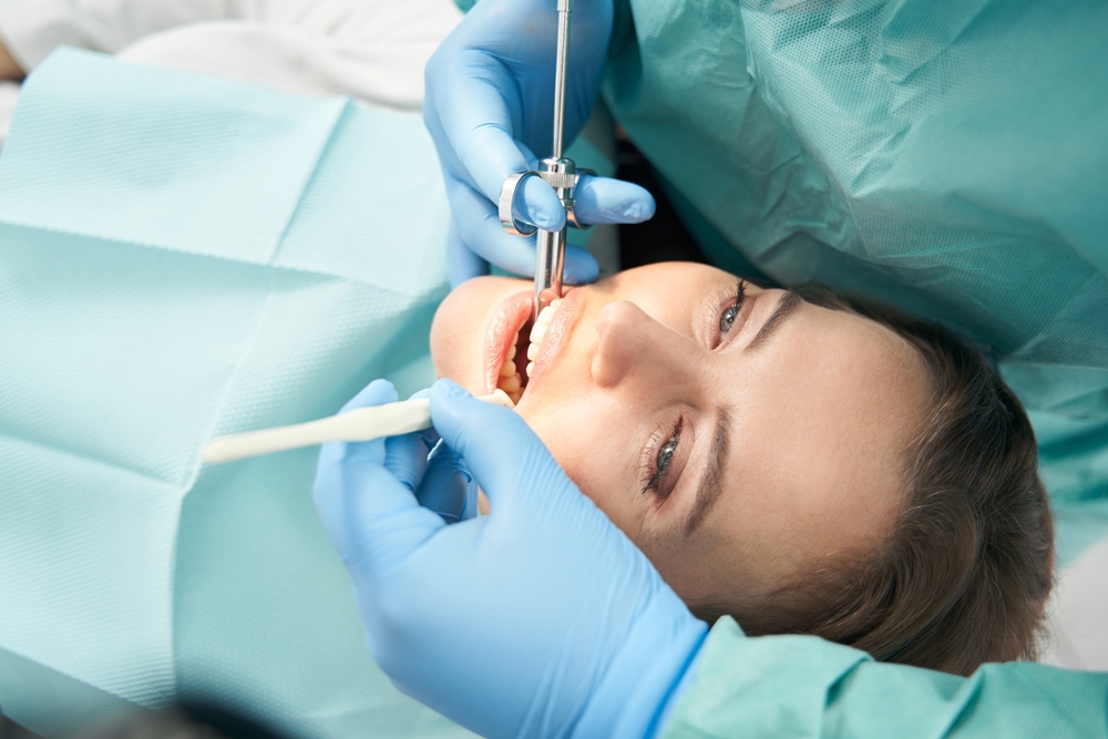 relaxed woman receiving dental treatment